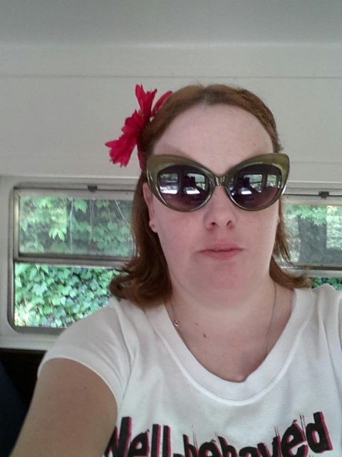 Me last summer on a train ride being silly :)